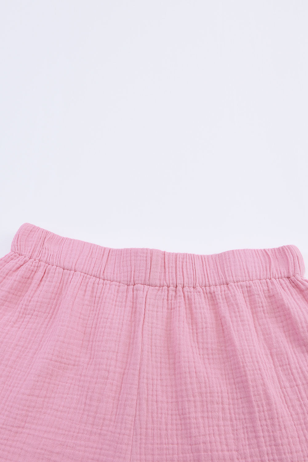 Ensemble chemise à manches longues effiloché rose et short décontracté