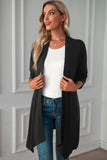 Cardigan doux noir uni ouvert sur le devant