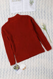 Pull en tricot zippé rouge à col roulé et épaules tombantes