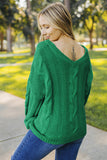 Pull vert en tricot tressé à col en V Bubblegum