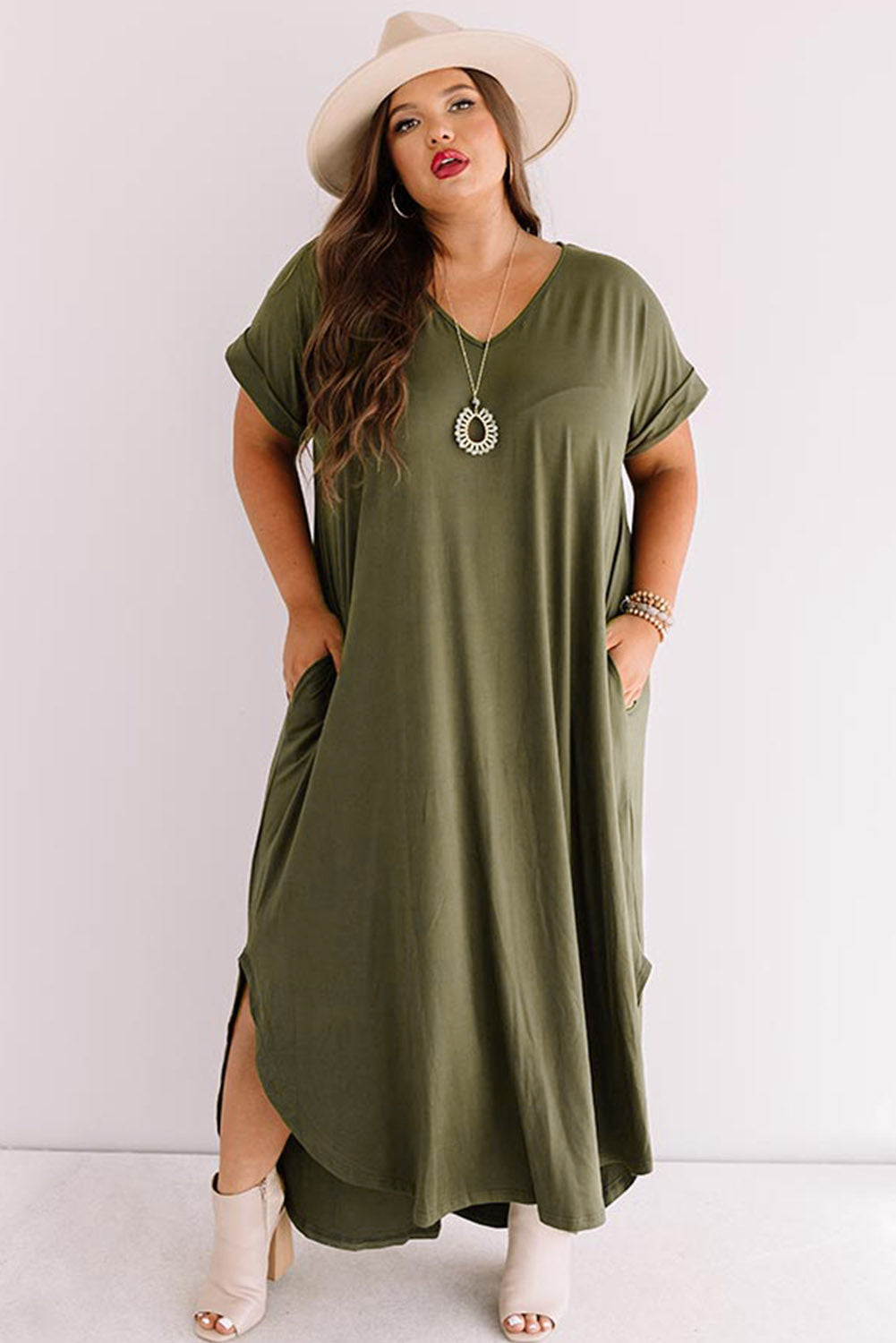 Robe longue verte à col en V et poignets roulés de grande taille