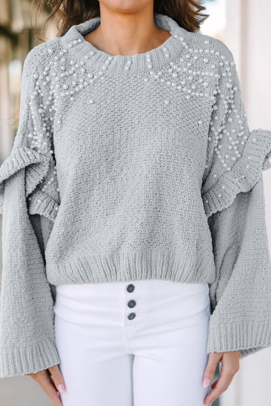 Pull gris à manches larges et volants orné de perles