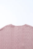 Cardigan texturé rose à épaules tombantes