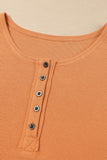 Haut Henley en tricot gaufré orange