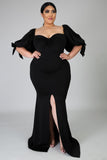 Robe longue noire avec nœud papillon et manches bouffantes, grande taille, fente haute