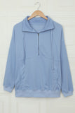 Sweat-shirt bleu ciel avec poches et demi-zip en coton