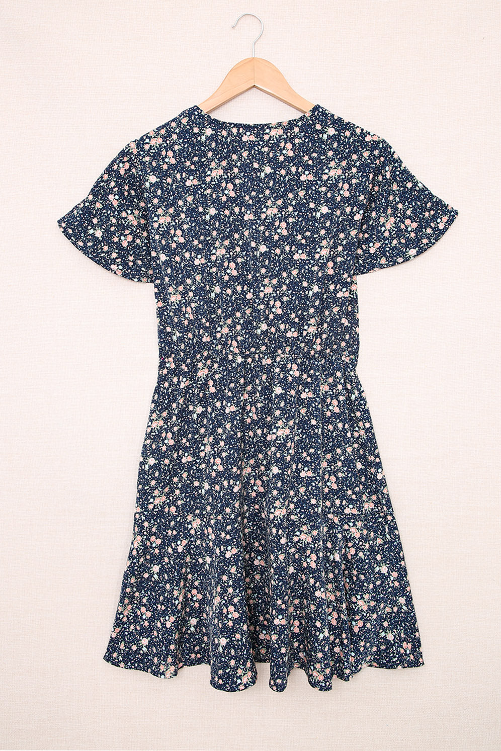 Mini-robe à imprimé floral et nœud papillon à volants et manches courtes bleue