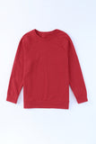 Sweat-shirt rouge uni à col rond et manches raglan 