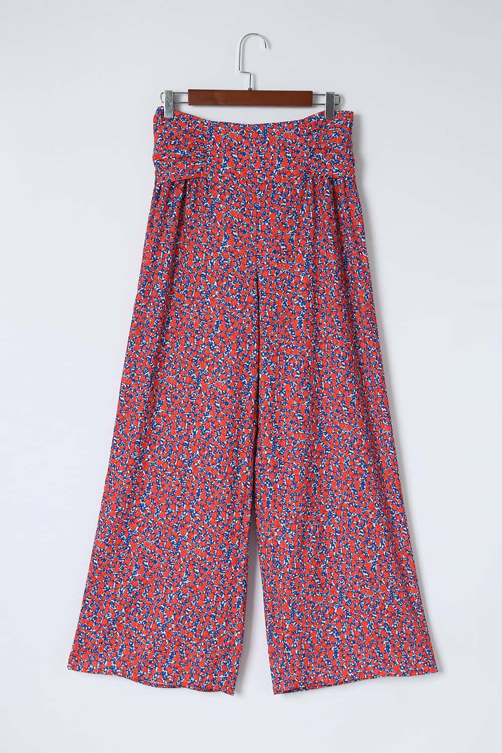 Pantalon large à petites fleurs et imprimé floral noué sur le devant 