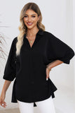 Chemise oversize noire à manches 3/4 bouffantes