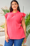 Blouse texturée froissée rose à manches bouffantes et à volants