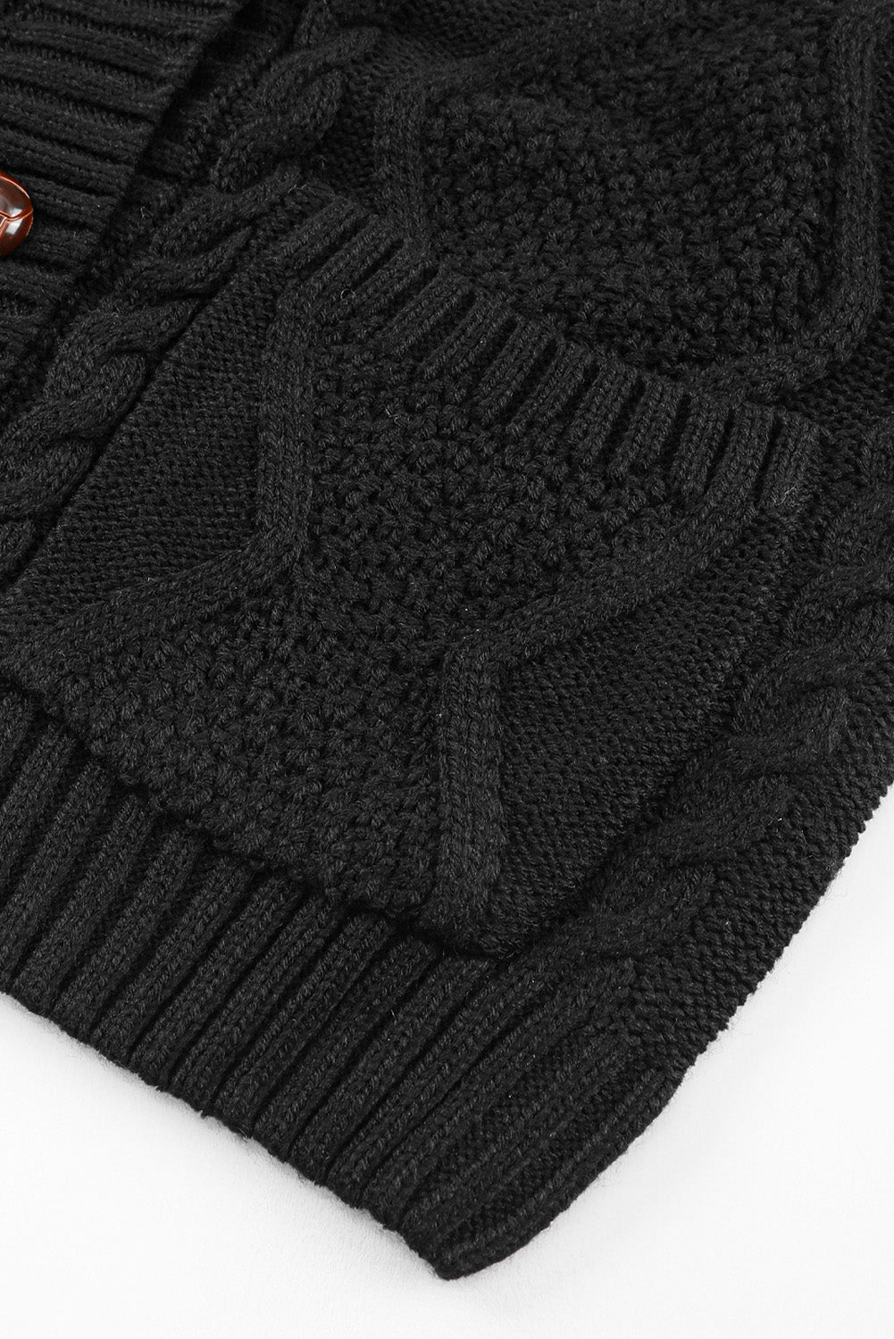 Cardigan texturé noir avec poches avant et boutons