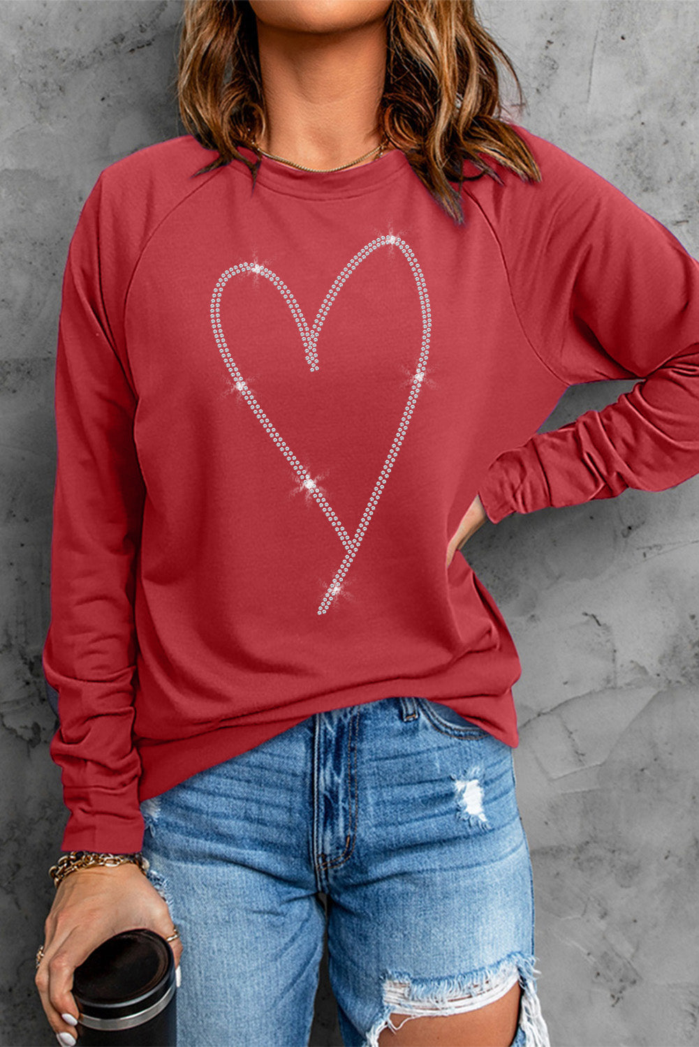 Sweat-shirt rouge uni à col rond et manches raglan 