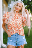 Blouse fleurie orange à manches flottantes et à plusieurs niveaux