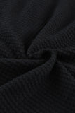 Chemise décontractée boutonnée en tricot gaufré noir