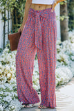 Pantalon large à petites fleurs et imprimé floral noué sur le devant 