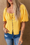 Blouse jaune froncée boutonnée à manches bouffantes