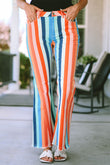 Pantalon en denim évasé à ourlet brut et rayures multicolores