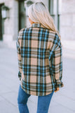 Chemise boutonnée à carreaux marron avec poches