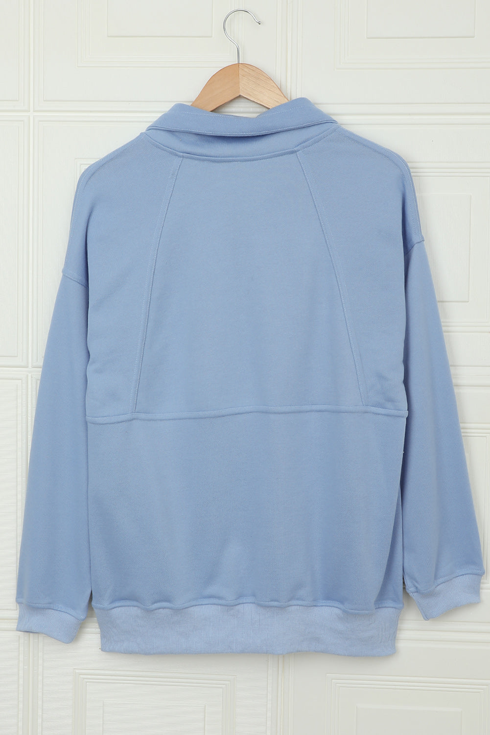 Sweat-shirt bleu ciel avec poches et demi-zip en coton