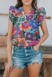 Blouse multicolore à imprimé floral et manches flottantes à volants