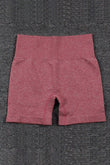 Short actif de sport taille haute de couleur unie rouge