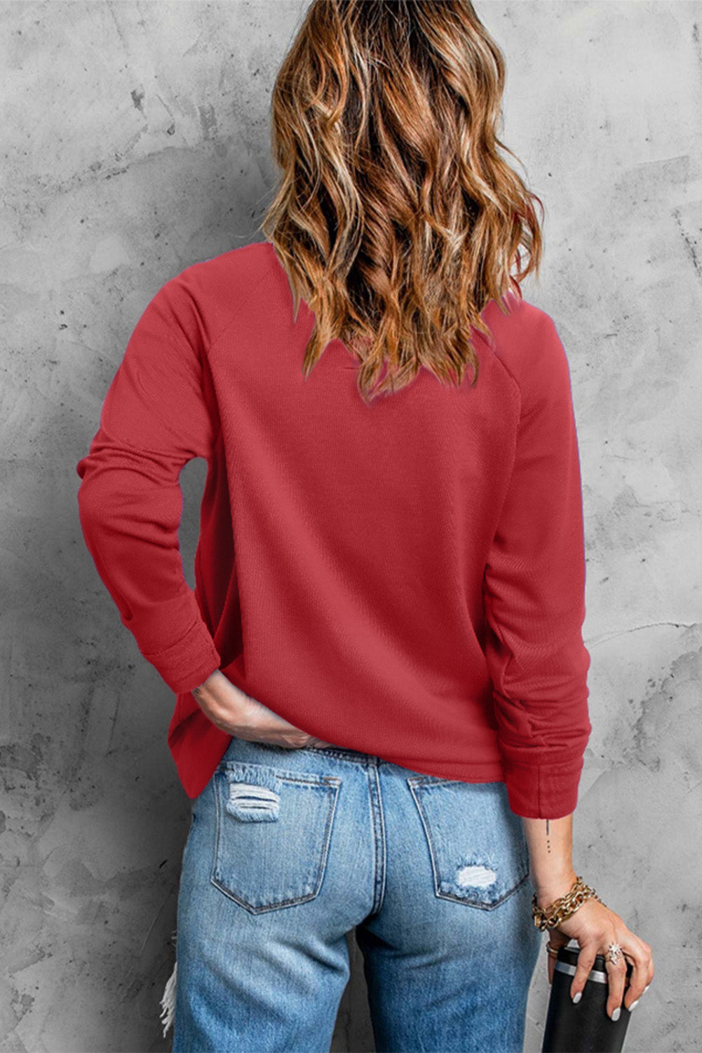 Sweat-shirt rouge uni à col rond et manches raglan 