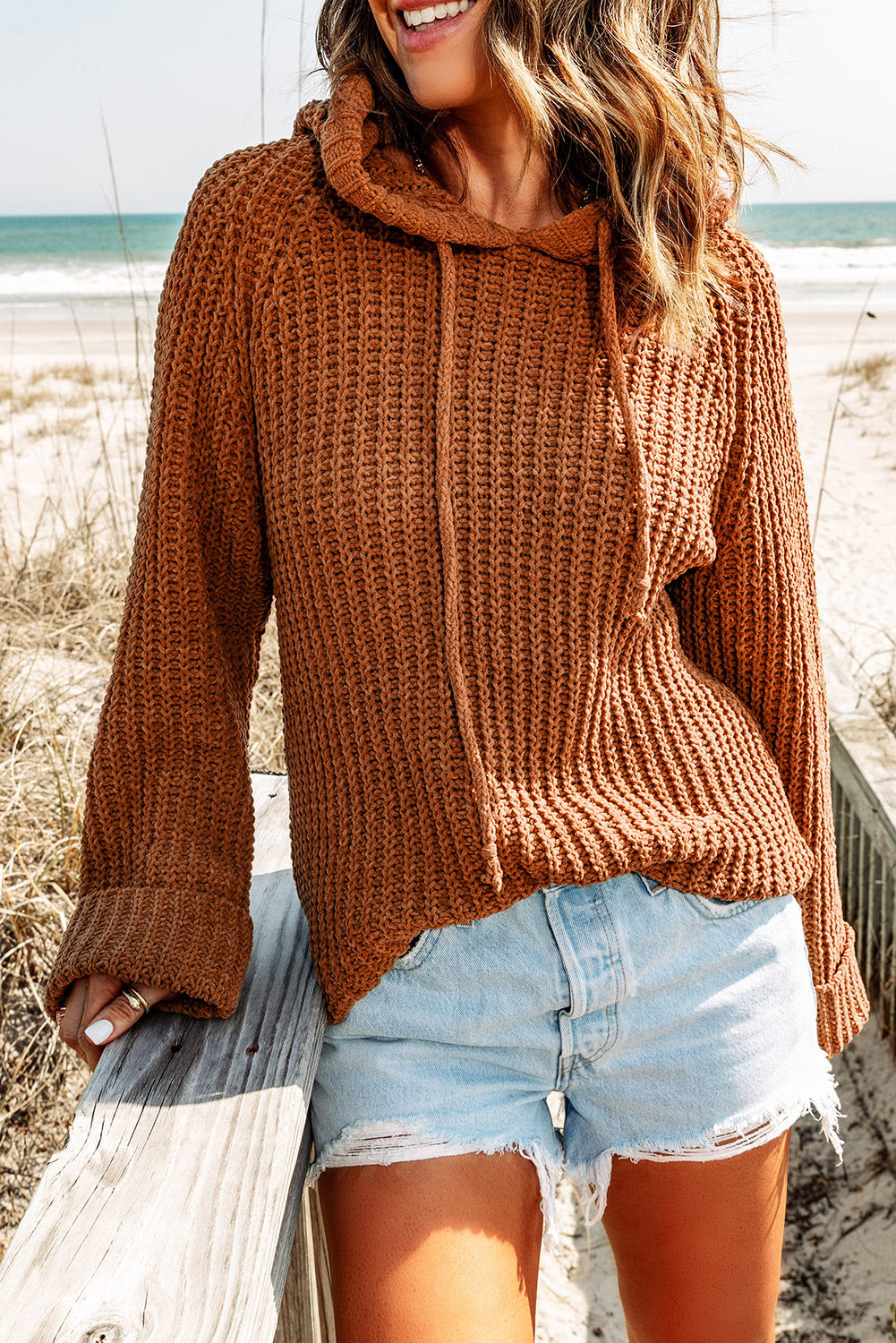 Pull à capuche en tricot avec cordon de serrage