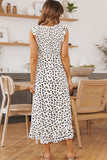 Robe midi haute et basse smockée léopard blanche