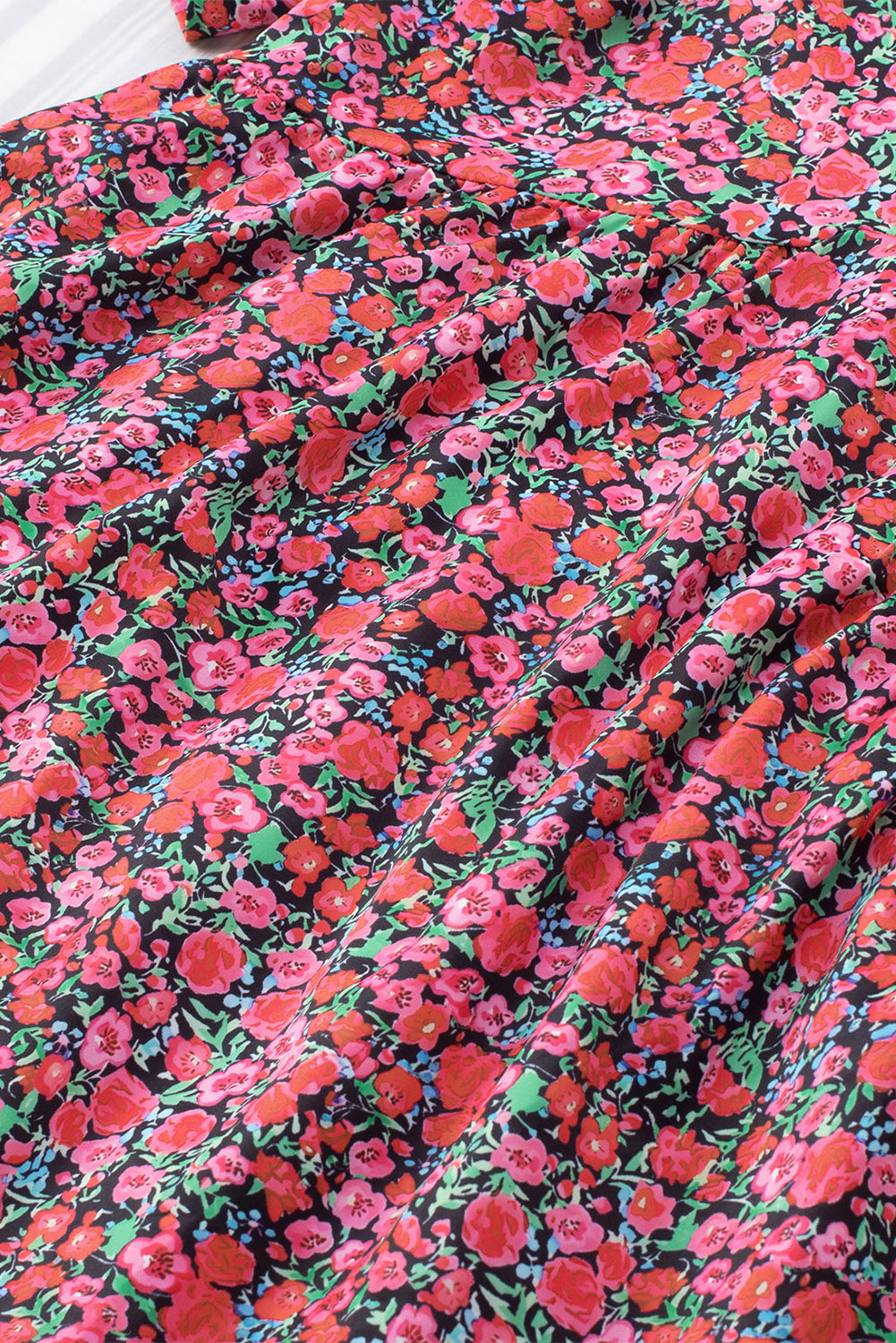 Robe florale rouge vintage à manches bouffantes et poches latérales