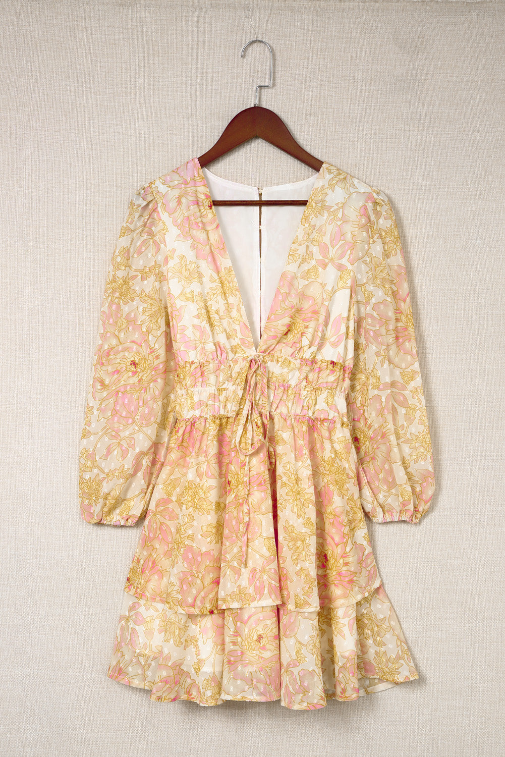 Robe florale jaune à manches longues et col en V