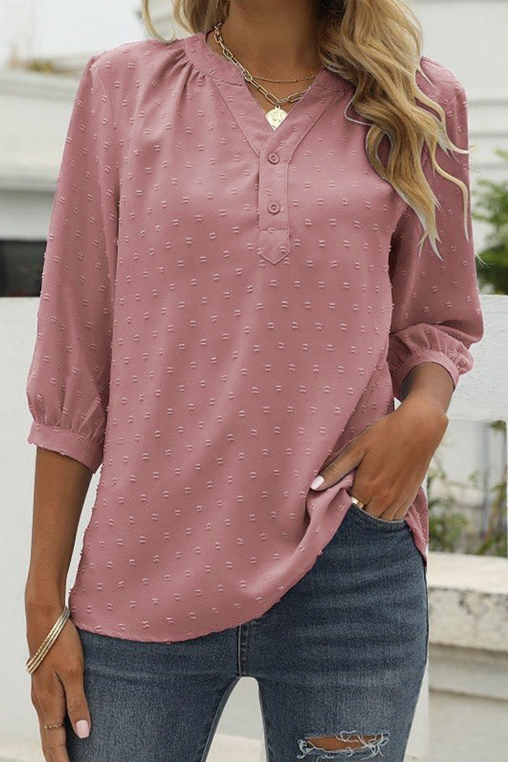 Blouse boutonnée à pois rose à manches mi-longues