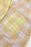 Chemise jaune boutonnée à manches longues et col en V à carreaux mélangés