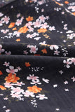 Kimono fluide noir à imprimé floral délicat