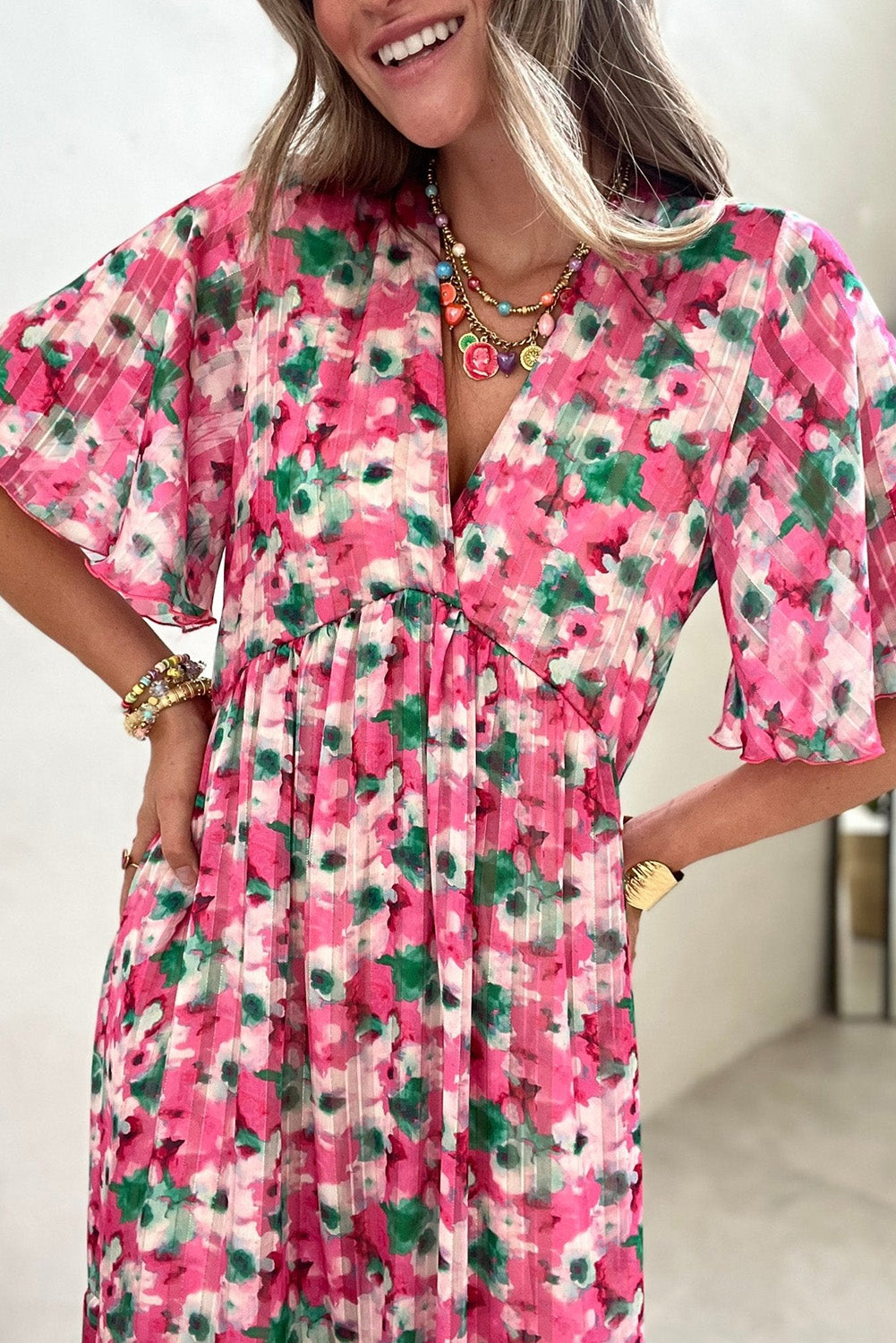 Robe longue rose à imprimé floral et manches larges