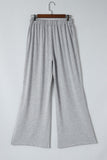 Pantalon taille haute gris à fentes latérales et jambes larges