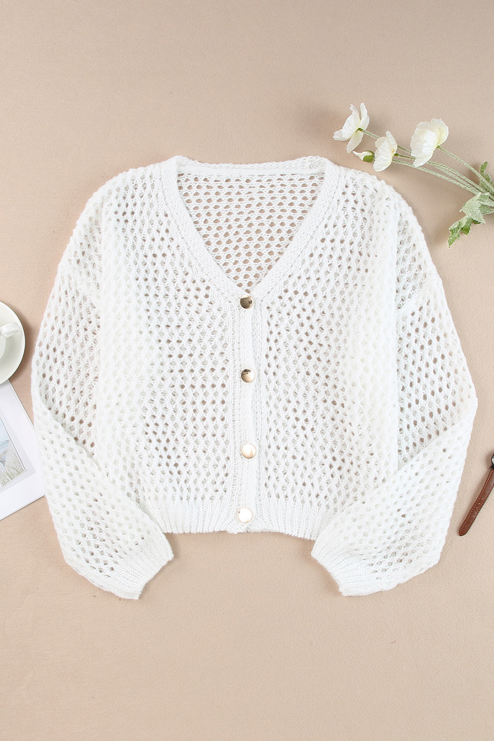 Cardigan pull blanc à manches dolman en tricot évidé