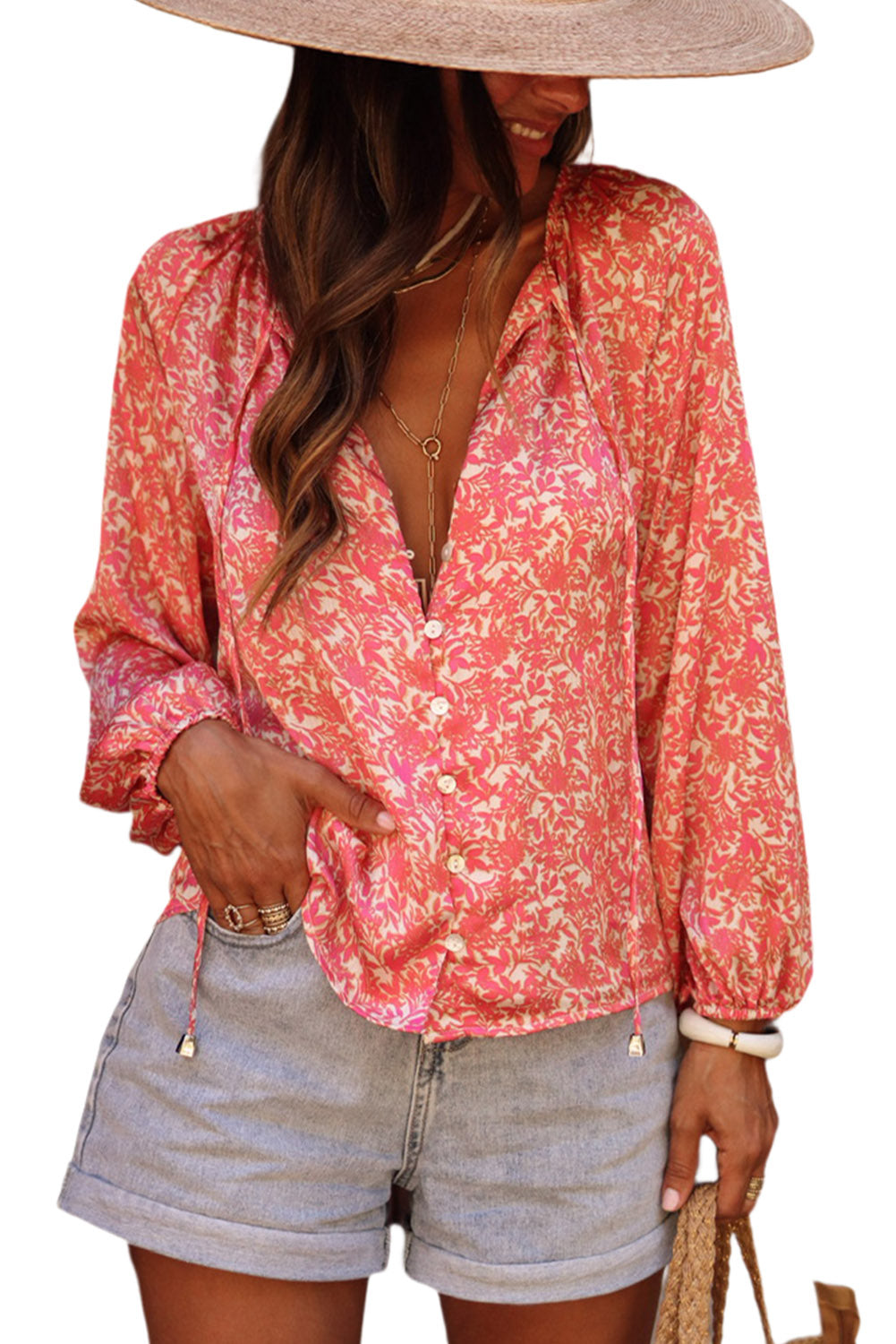 Chemise florale rose à manches bulles avec lacets