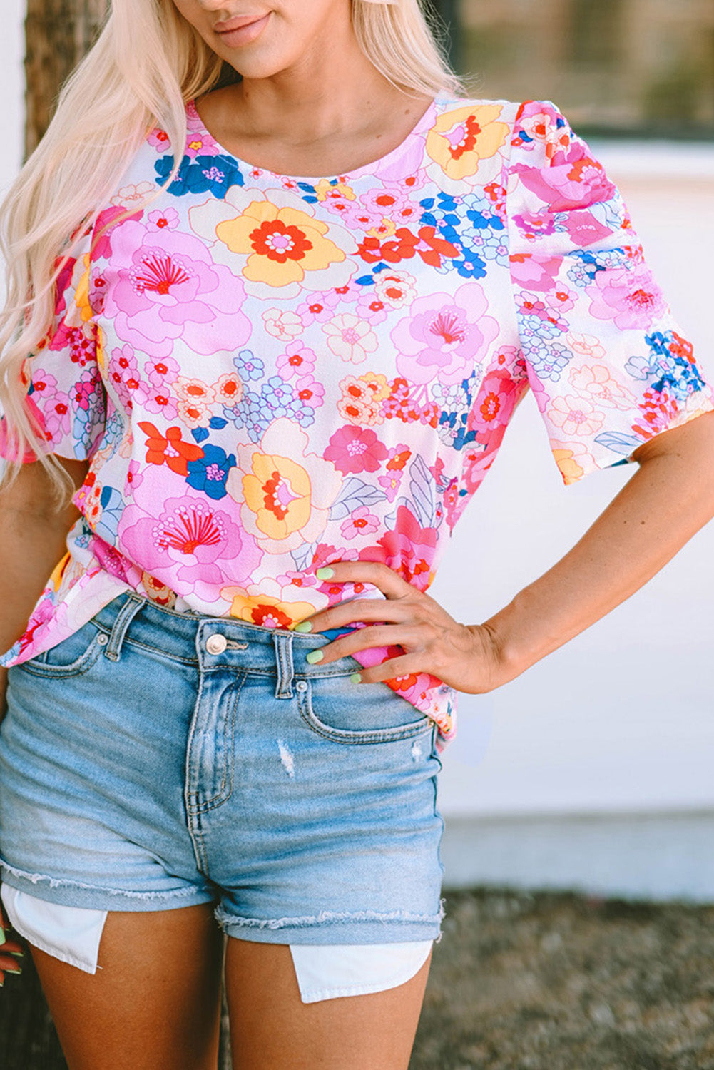 Blouse florale froncée à manches bouffantes