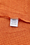 Haut en tricot gaufré color block léopard orange