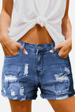 Vintage Faded and Distressed Denim Shorts