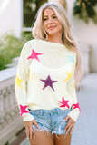 Pull ample blanc à motif d'étoiles colorées