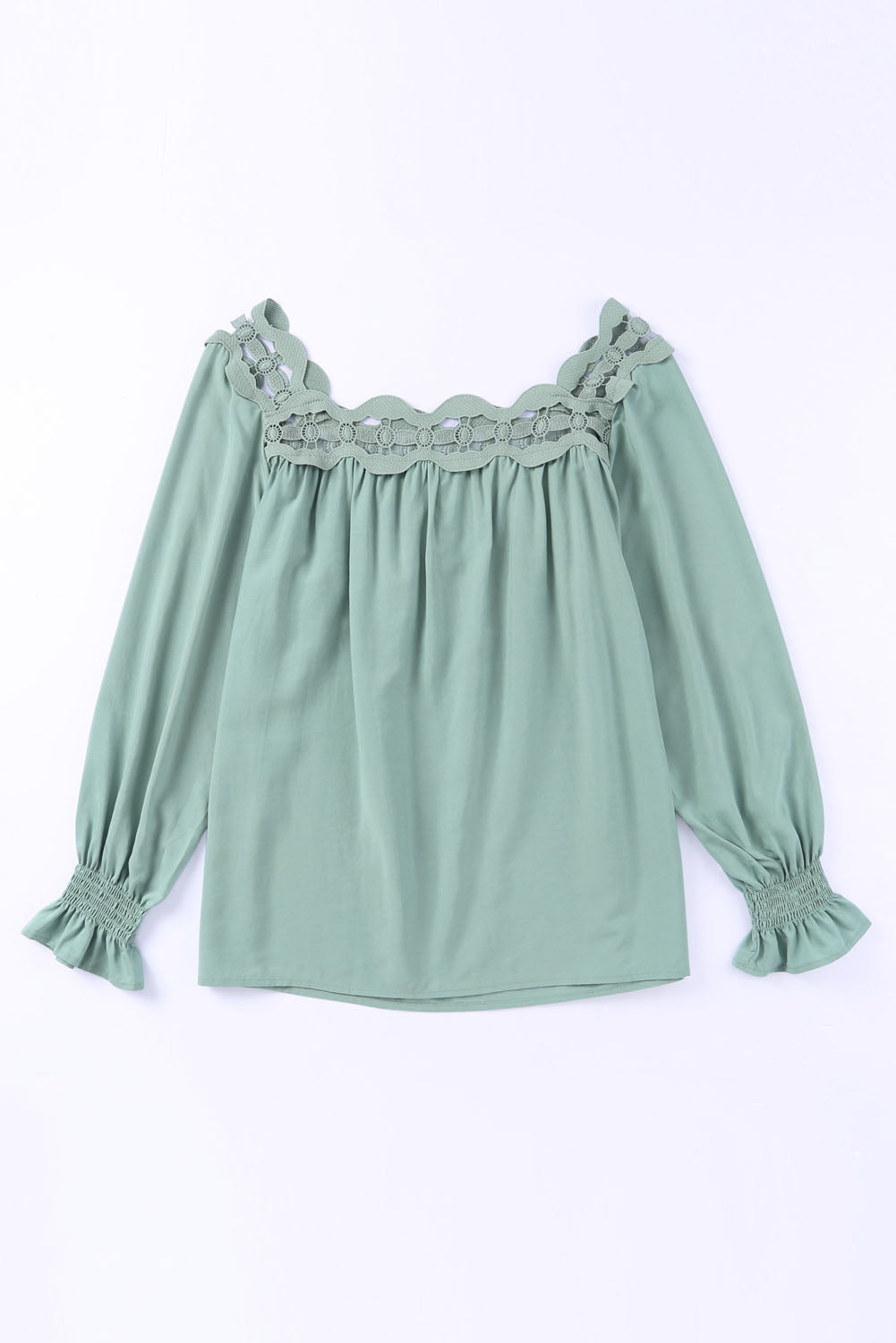 Blouse verte à col festonné et ajourée en dentelle 