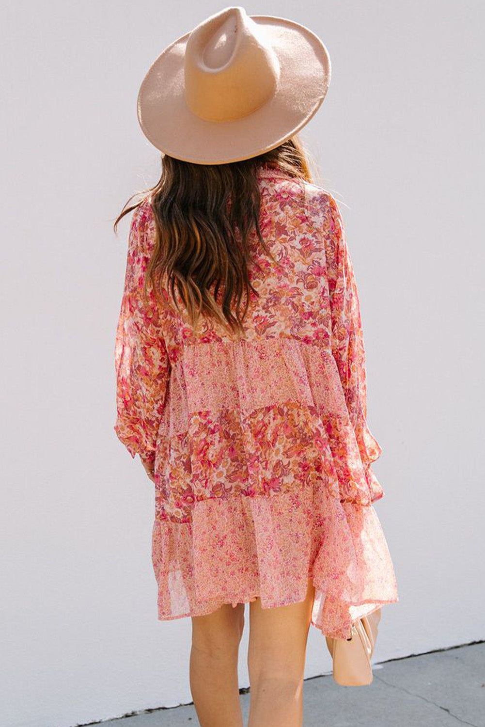 Robe rose à imprimé floral et manches bouffantes