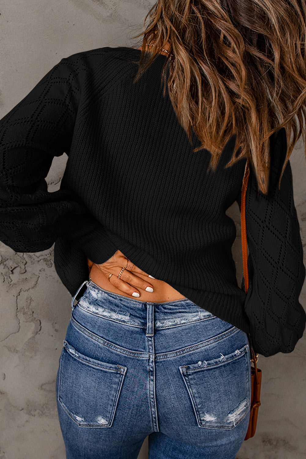 Pull boutonné à manches évêque et col en V