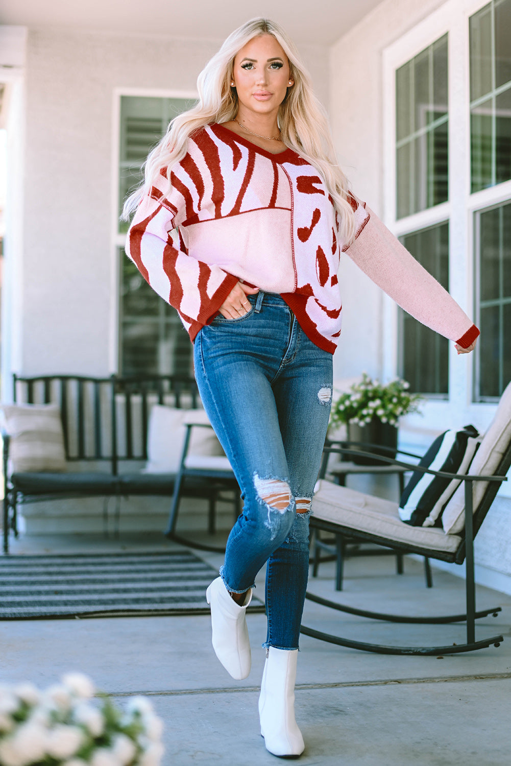 Pull oversize rouge en tricot à motifs mélangés et bordure côtelée