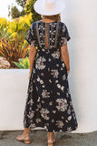 Robe longue bleue à fleurs, col en V, taille empire, avec doubles fentes