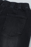 Pantalon en denim noir effet vieilli à cloche