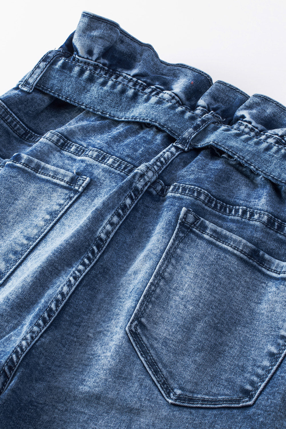 Jean skinny bleu à coutures et coutures hautes avec nœud