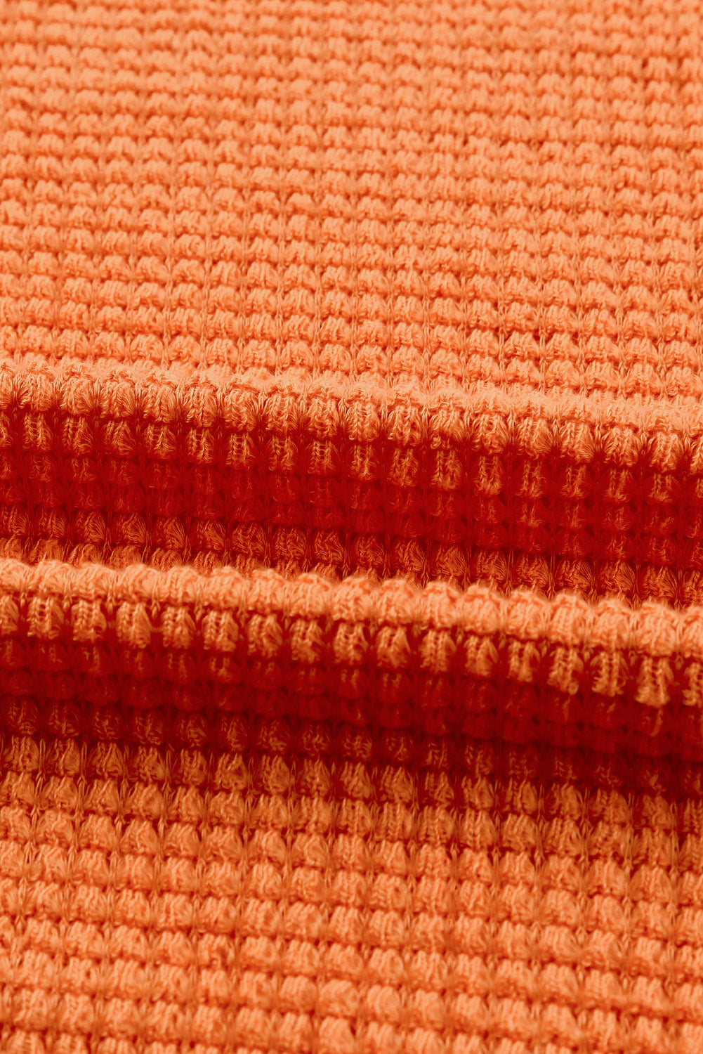 Haut en tricot gaufré color block léopard orange